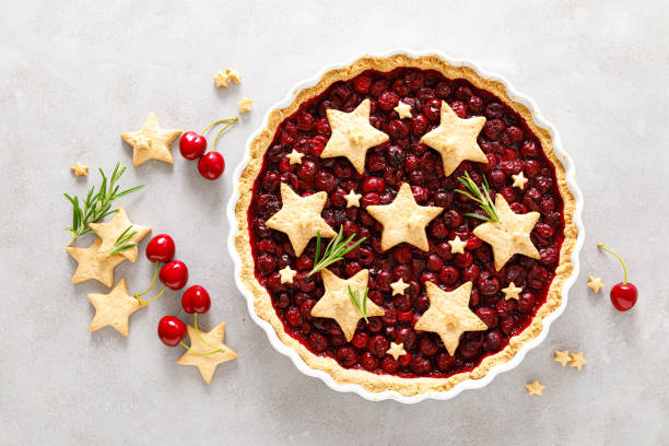 istock Homemade cherry pie, tart with star shaped cookies 1260406863