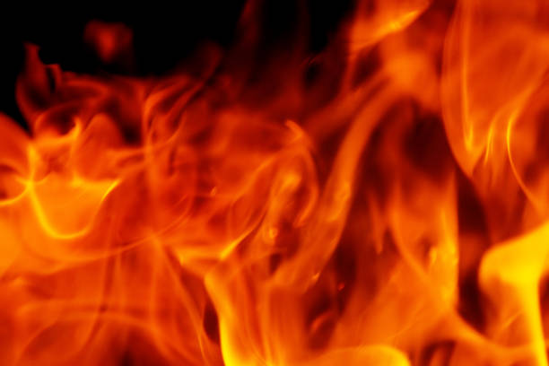 Fire in the dark, close up. Can be used as background