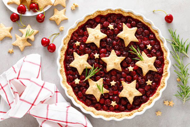 istock Homemade cherry pie, tart with star shaped cookies 1260414554