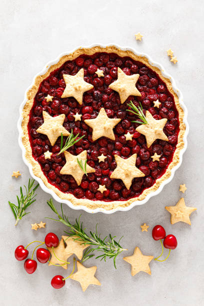 istock Homemade cherry pie, tart with star shaped cookies 1260420076