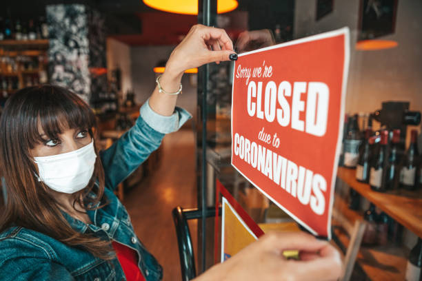 istock Small business closing sign due to Covid-19 coronavirus 1260425470