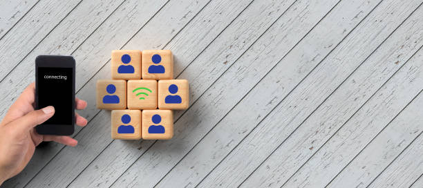 istock cubes with people symbols and wifi symbol between them 1260443563