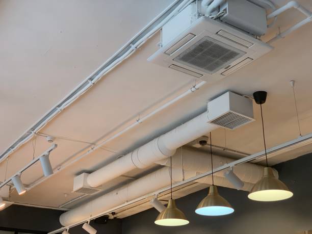istock Ventilation pipes and grilles, and lamps hanging from the ceiling 1260445751