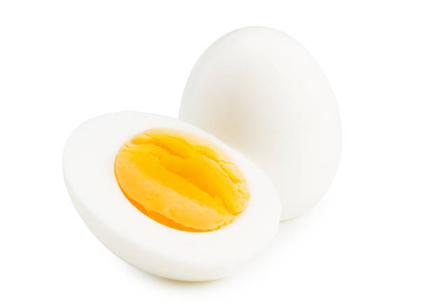 istock Single whole boiled egg with halved egg isolated on a white background 1260450072