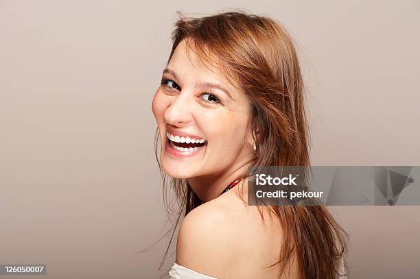 Portrait Of Laughing Redhead Woman Turning Around Stock Photo - Download Image Now - Laughing, Naked, Shoulder