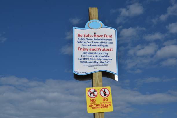 istock Sign at entrance to beach. 1260502846