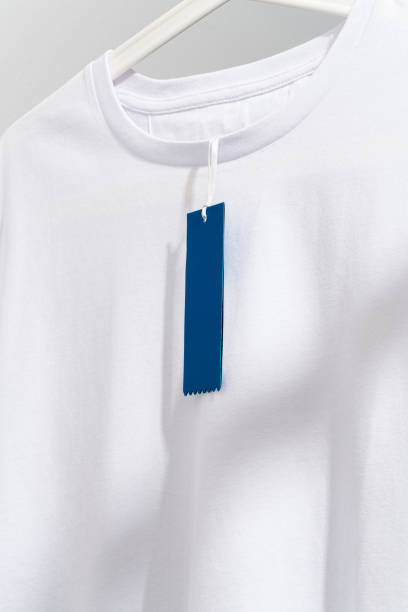 istock t-shirt with blank price tag on hanger 1260508934