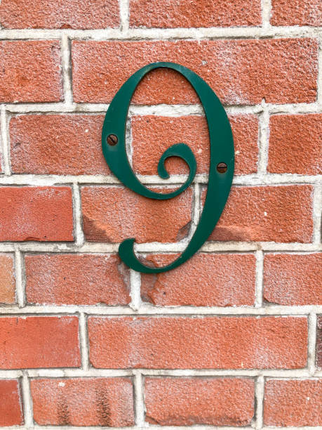 istock number nine hanged on a brick wall 1260526362