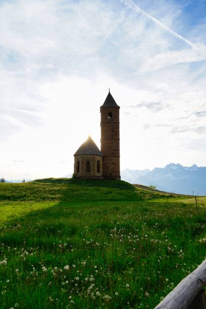 istock little chapel in Hafling with meadow, Italy 1260543279