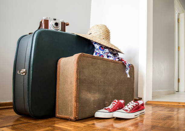 istock travel concept suitcase and map 1260544056