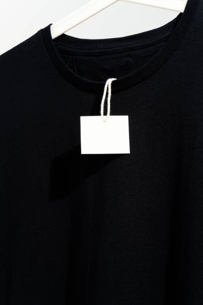 istock Black t-shirt with blank price tag on hanger 1260544587