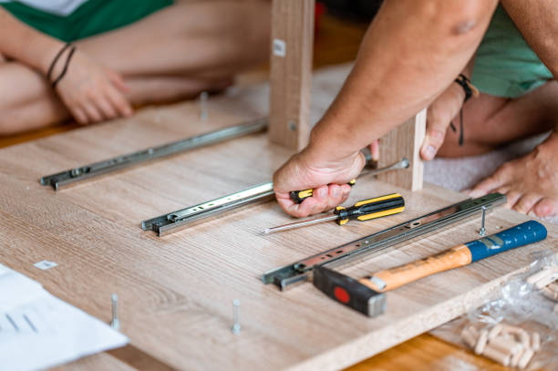 istock Assembling a new furniture 1260586710