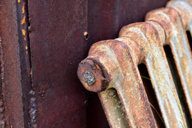 istock Rusty section of the heating battery in scrap metal 1260599185