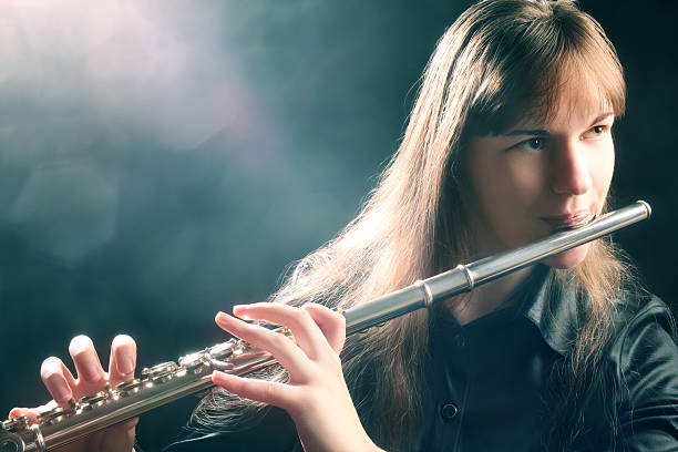 istock Flute playing flutist musician performer 126064363