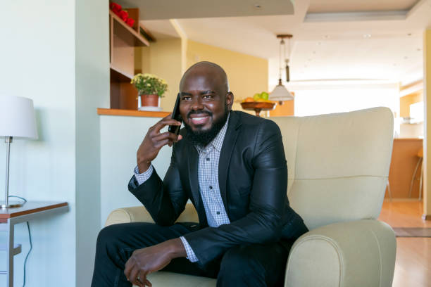 istock Man Having Good News on Mobile at Home Office 1260644051