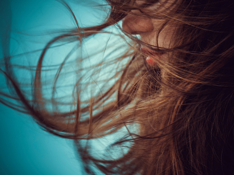 Woman's hair blowing in the wind
