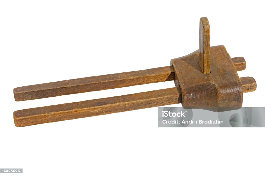 Old woodworking marker gauge tool. Isolated on a white background Antique Stock Photo