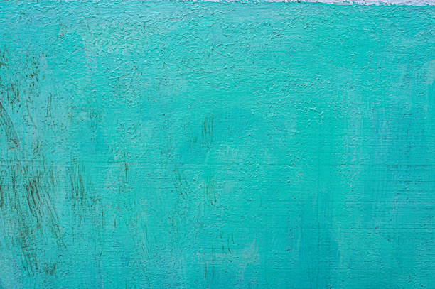 istock cracked paint, many layers, old blue paint. dirty texture 1260728396