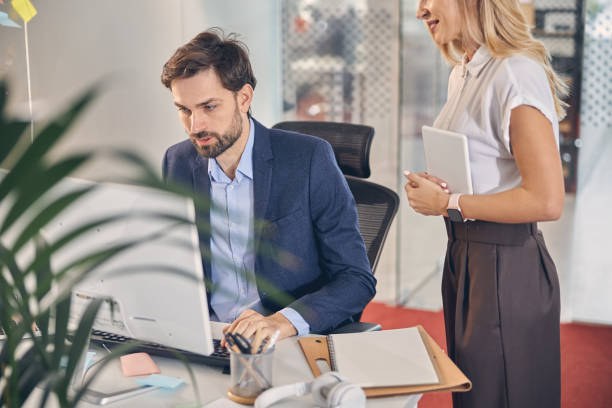 istock Business colleagues working together in modern office 1260733154