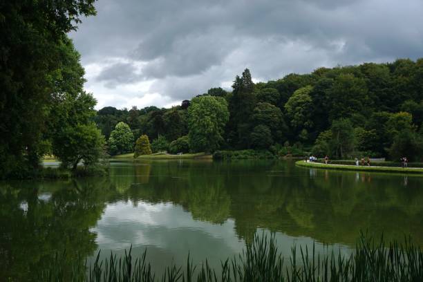 istock View of a reflective lake on an overcast day 1260768985