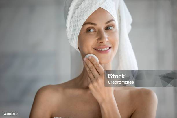 Woman Holding Cotton Pad Uses Gel Biphasic Cleanser Removing Makeup Stock Photo - Download Image Now