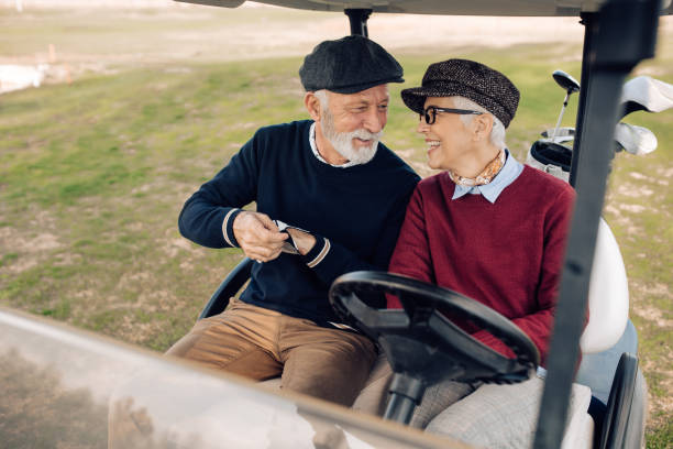istock Senior couple having their weekend golf recreational activities 1260815245
