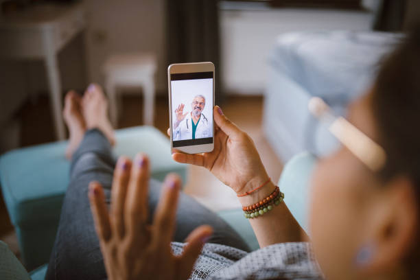 istock Unrecognisable Woman Having Video Call With A Doctor. 1260818613