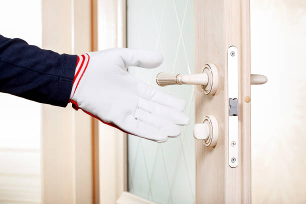 istock Male hand in glove indicates a door lock. 1260851429
