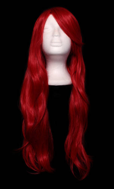 istock Red Orange Anime Style Wig on Black 1260873684