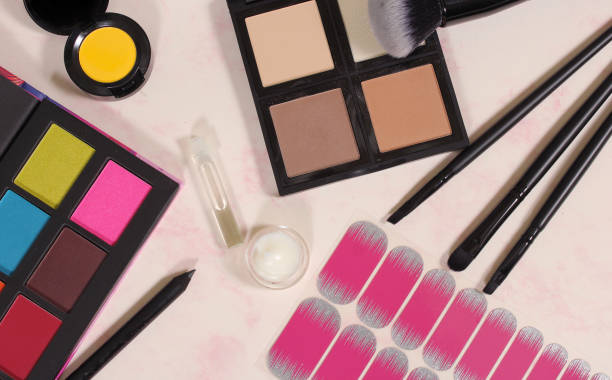 istock Various Cosmetics and Cosmetics Applicators on Paper 1260877822