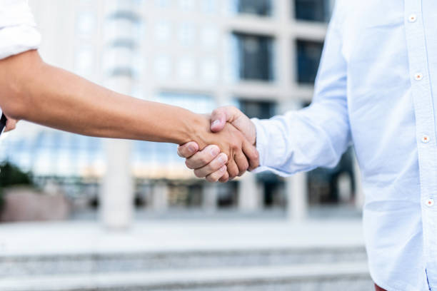 istock Business people shaking hands close-up. 1260920625