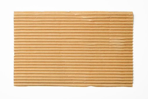 Overhead shot of corrugated cardboard isolated on white with clipping path.