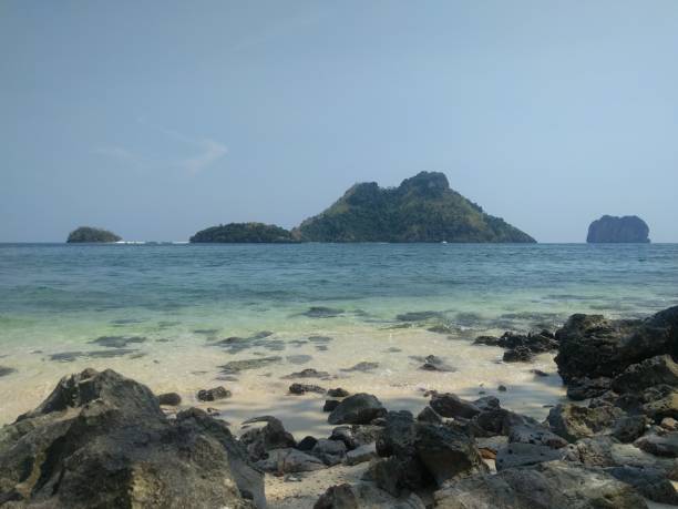 istock Island sea scape beach view 1261034423