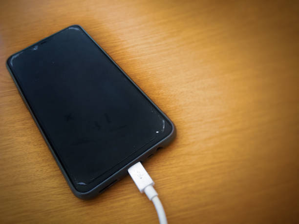 istock Close up  handphone in the charger 1261034781