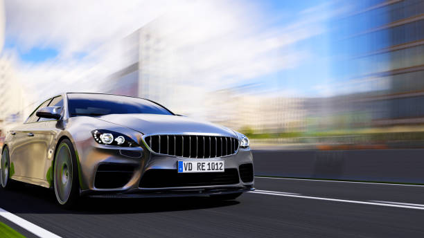 istock car driving on a road 1261057062