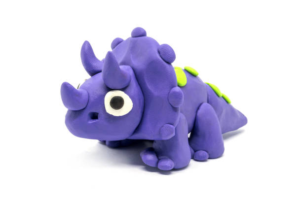 istock Play dough Triceratopson on white background 1261082291