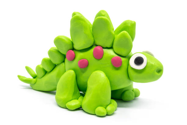 Play dough Stegosaurus on white background Play dough Stegosaurus on white background childs play clay stock pictures, royalty-free photos & images