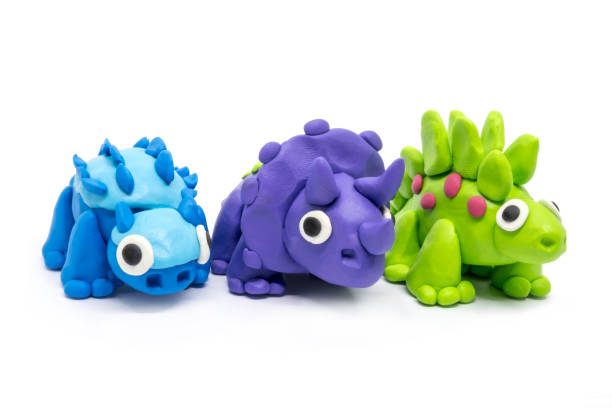 istock Play dough group Stegosaurus, Triceratopson, Ankylosaurus on white background 1261082801