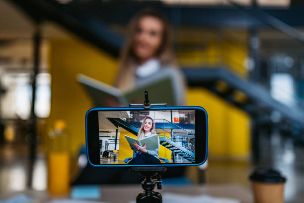 istock Young woman holding online education course 1261113552
