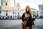 Woman text messaging in Vienna