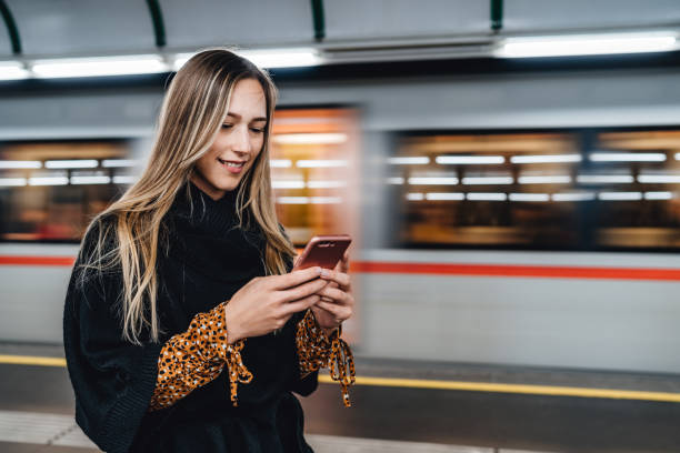 Woman checking ride schedule on phone