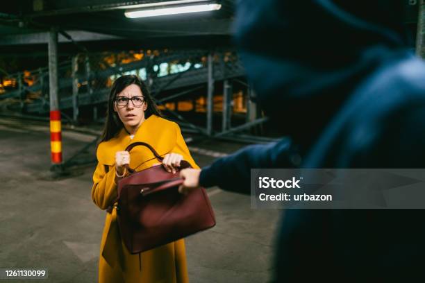 Thief In Action Stock Photo - Download Image Now - Thief, Purse, Street