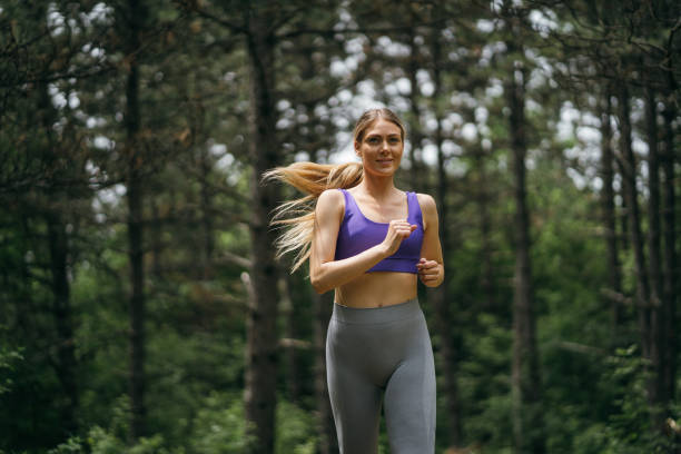 istock Sports woman jogging 1261130968