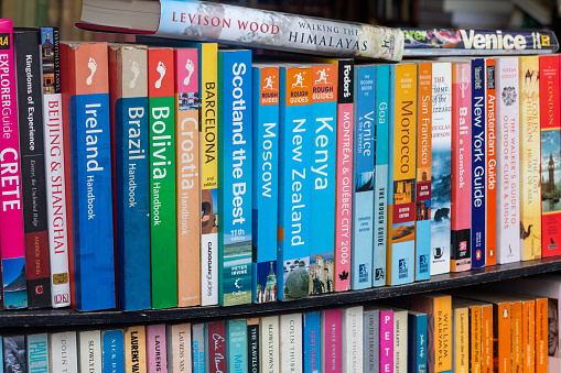Guidebooks in Camden, London, including to world destinations. Publishing companies can be seen as well as travel book names such as Rough Guide.