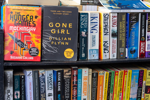 Fiction Paperbacks in Camden, London, including novels from Gillian Flynn, Stephen King, Tom Clancy, Frederick Forsyth and Suzanne Collins