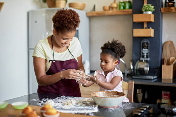 istock Young Afro-Caribbean Girl Learning Baking is Messy Work 1261143815