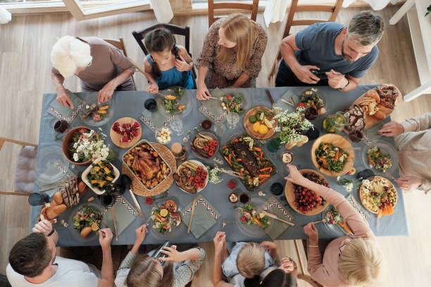 istock Family having dinner at home 1261155495