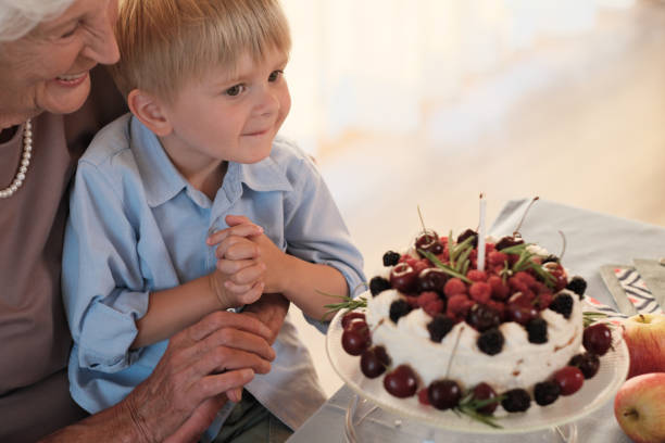 Little boy with his birthday cake