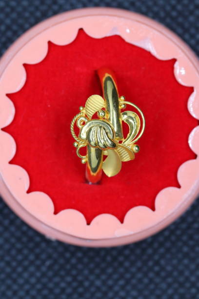 istock Shiny fancy gold ring designs for girls 1261170079