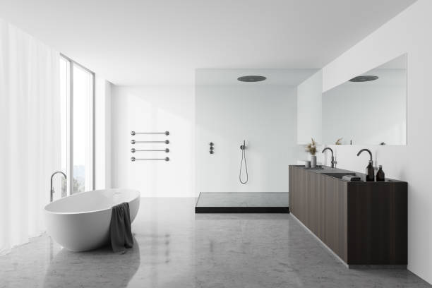 istock White bathroom with tub, shower and sink 1261207894